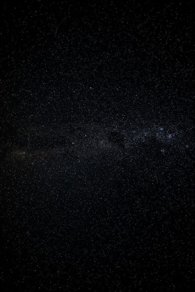 A vast starry night sky with the milky way visible.